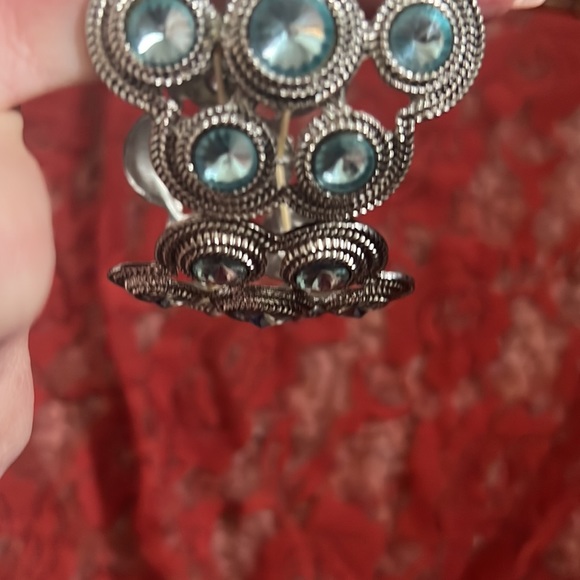 Two bracelets. One is stretch, Blue and silver and one has a clasp, tan and gold - Picture 5 of 7